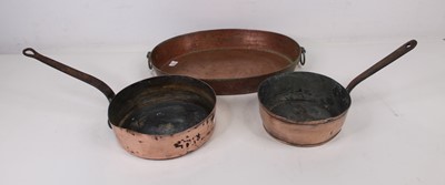 Lot 198 - Two Victorian copper pans, together with a...