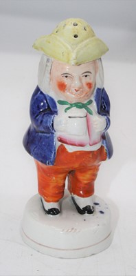 Lot 244 - A Vicotrian Staffordshire Toby shaker, 14cm high