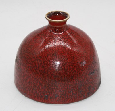 Lot 247 - A Chinese mottled red glazed inkwell, bearing...