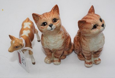 Lot 274 - Two Beswick models of seated cats, each 9.5cm,...