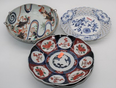 Lot 296 - A Meissen blue onion pattern porcelain plate...