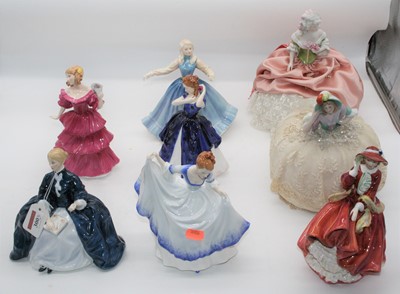 Lot 300 - A collection of various porcelain figures of...