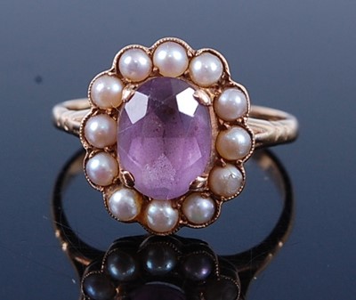 Lot 2518 - A yellow metal, amethyst and pearl oval...