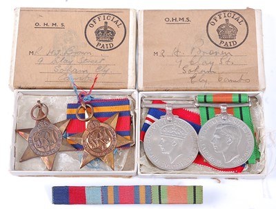 Lot 269 - A group of four WW II medals, to include...
