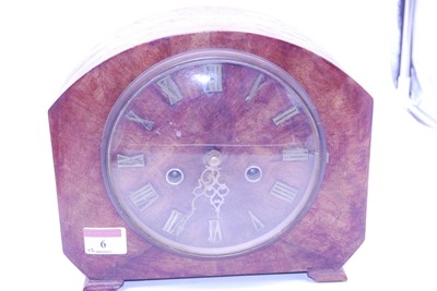 Lot 6 - A 1950s walnut cased mantel clock having...