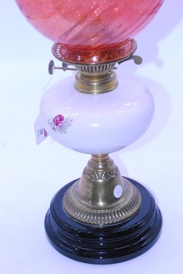 Lot 20 - A late Victorian oil lamp having an orange...