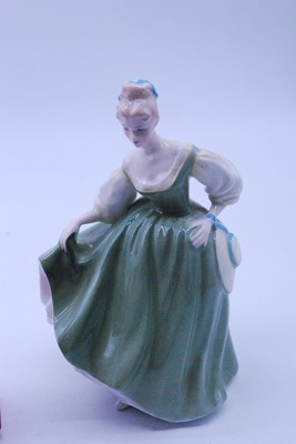 Lot 22 - A collection of five Royal Doulton figurines...