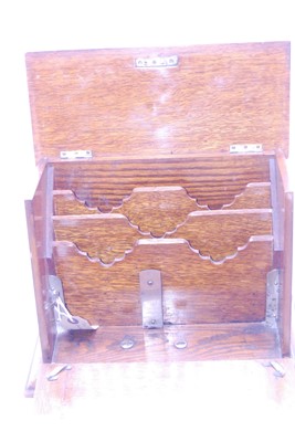 Lot 45 - An Edwardian oak stationery cabinet, having a...