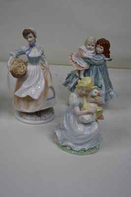 Lot 102 - A collection of four Royal Worcester figurines,...