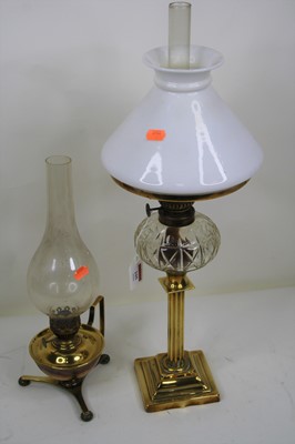 Lot 105 - An early 20th century oil lamp with chimney,...