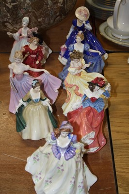 Lot 120 - A collection of 9 Royal Doulton figurines to...