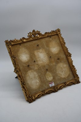 Lot 135 - A 19th century giltwood easel frame for...