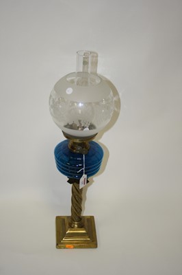 Lot 127 - A Victorian pedestal oil lamp, having globular...
