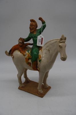 Lot 142 - A Tang style hollow moulded model of a horse...