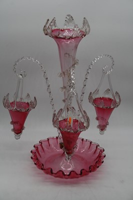 Lot 144 - A Victorian cranberry tinted glass table...