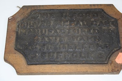 Lot 149 - A cast iron wall plaque for the Ilford Silver...