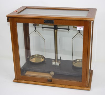Lot 150 - A mid-20th century set of chemists' scales,...
