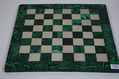 Lot 155 - A malachite and polished hardstone chessboard,...