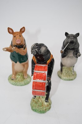 Lot 186 - A collection of six Beswick ware pig musician...