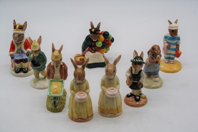 Lot 210 - A collection of nine Doulton Bunnikins figures,...