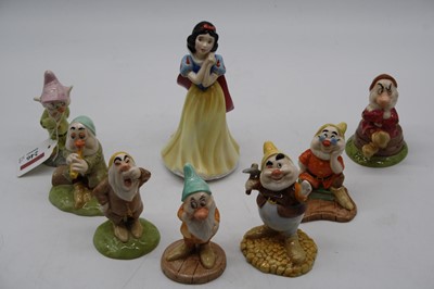 Lot 246 - A collection of eight Royal Doulton Walt...