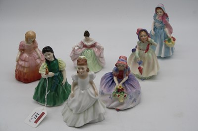 Lot 247 - A collection of seven Royal Doulton figurines,...