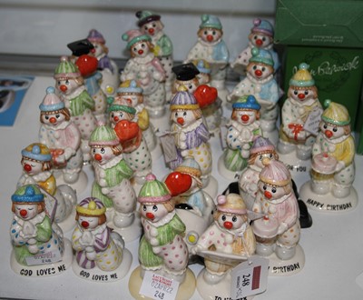 Lot 248 - A large collection of Beswick clown figures,...