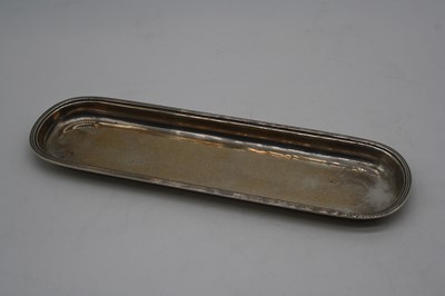 Lot 255 - An early 20th century silver pin tray, of...