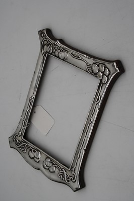 Lot 258 - An Art Nouveau silver clad easel photograph...