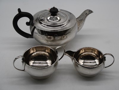 Lot 259 - A George V silver bachelors three-piece tea...