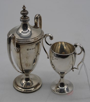 Lot 288 - A George V silver twin handled trophy cup,...