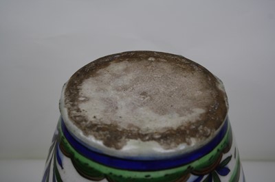 Lot 97 - An Iznik tin glazed earthenware vase (ground...