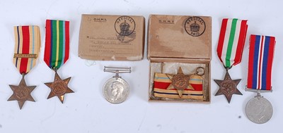 Lot 92 - A collection of six WW II medals, to include a...