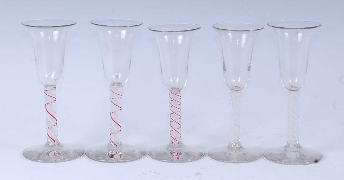 Lot 1044 - A matched set of three 18th century style wine...