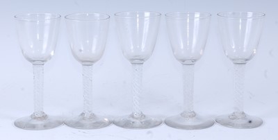 Lot 1045 - A set of five 18th century style wine glasses,...