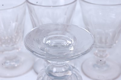 Lot 1046 - A matched set of nine late Georgian glass...