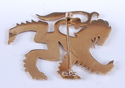 Lot 2552 - A 9ct yellow gold lion rampant brooch, with...