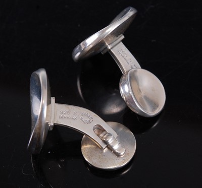 Lot 2562 - A pair of Georg Jensen silver concave disc...