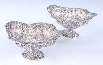 Lot 1093 - A pair of late Victorian silver pedestal...