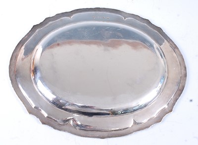 Lot 1113 - A mid-20th century silver salver, of shaped...