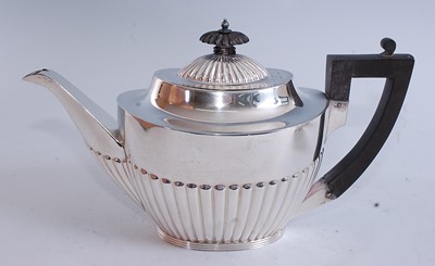 Lot 1098 - An Edwardian silver three-piece tea service,...
