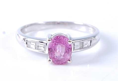 Lot 2572 - An 18ct white gold, pink sapphire and diamond...