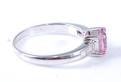 Lot 2572 - An 18ct white gold, pink sapphire and diamond...