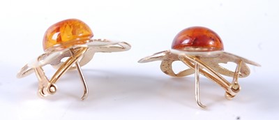 Lot 2568 - A pair of yellow metal amber stud earrings,...