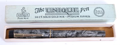 Lot 82 - Four vintage pens, comprising a boxed Unique...