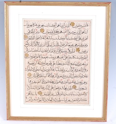 Lot 2462 - Koran, a folio written in black Naski script...