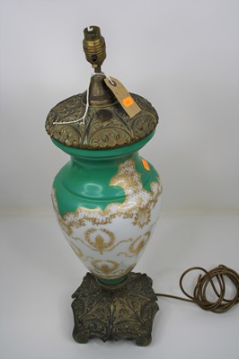 Lot 2 - A 20th century green and gilt decorated milk...