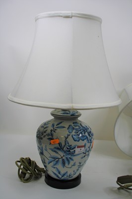 Lot 9 - A pair of 20th century porcelain table lamps,...