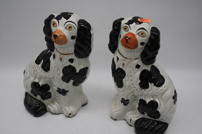 Lot 11 - A set of three Staffordshire pottery model of...