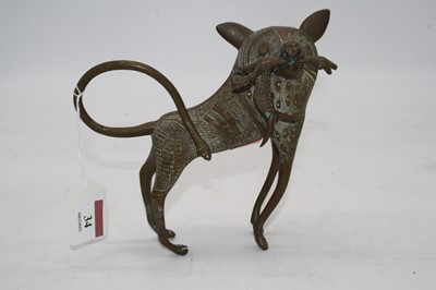 Lot 34 - An eastern brass model of an animal, 7cm high